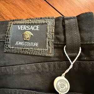 Men’s/Unisex Black Versace Jeans Couture 
Italian size 34/48. New w Tag